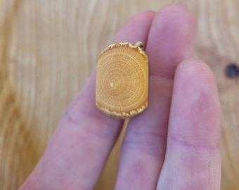 Natural, light-colored dreadlock bead made from hibiscus wood, 7 mm