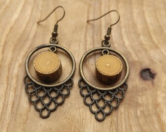 Beautiful earrings made of brass and hibiscus wood