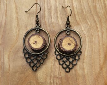 Beautiful earrings made of brass and cork oak wood.