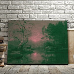 May include: A canvas print of a landscape painting featuring a serene forest scene. The artwork depicts a river reflecting the sky's pink and green hues, with trees and rocks adding depth. A deer stands near the water's edge.