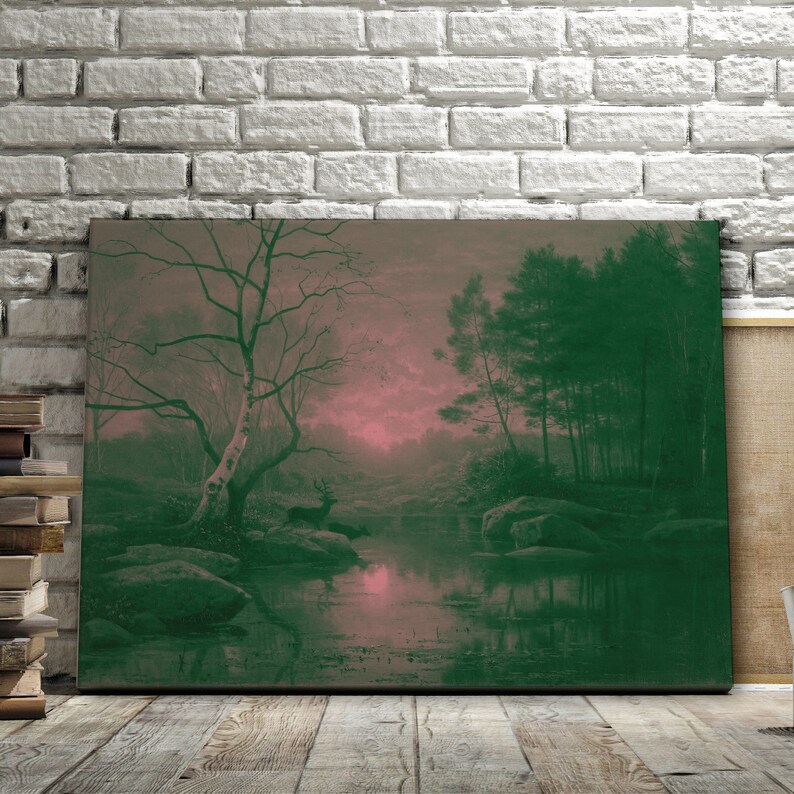 May include: A canvas print of a landscape painting featuring a serene forest scene. The artwork depicts a river reflecting the sky's pink and green hues, with trees and rocks adding depth. A deer stands near the water's edge.