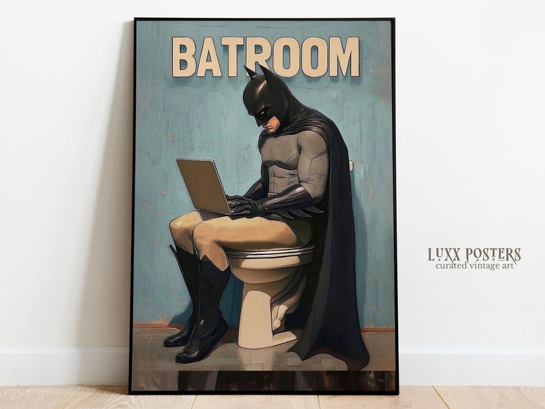 May include: A humorous illustration of Batman sitting on a toilet, wearing his iconic costume, and using a laptop. The text "BATROOM" is displayed above him.