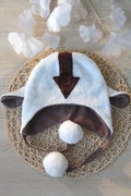 Faux Fur Bison Hat: White Fluffy Winter Cap with Brown Arrow product logo