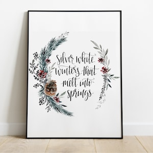 May include: A watercolor print with a wreath of pine branches, berries, and leaves. The text in the center reads "Silver white winters that melt into springs."