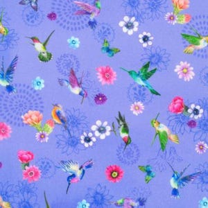 May include: A vibrant pattern featuring hummingbirds, butterflies, and flowers in shades of pink, green, blue, and purple. The design includes detailed illustrations of various flowers and insects on a light purple background.