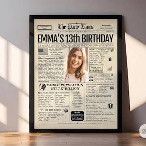 May include: A framed newspaper-style print celebrating Emma's 13th birthday. The headline reads "EMMA'S 13th BIRTHDAY" with details about the year she was born. Includes a photo of Emma, facts, and a "Happy 13th Birthday" message.