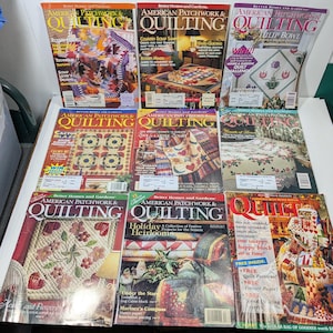 May include: A collection of nine Better Homes and Gardens American Patchwork & Quilting magazines arranged in three rows. Each cover features colorful quilt designs, instructional text, and headlines about various quilting techniques and projects.