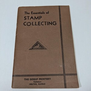 May include: A vintage book titled "The Essentials of Stamp Collecting" with a brown cover. The title is in black, centered at the top. The book also features the publisher's name, "THE GOSSIP PRINTERY," and location, "HOLTON, KANSAS."