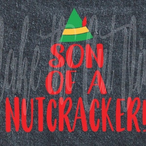 May include: Red text on a dark gray background reads "Son of a Nutcracker!" with a green elf hat above the text.