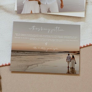 May include: A wedding invitation with a photo of a couple on the beach. The invitation says "nothing fancy just love" and "mr. + mrs. jamison".