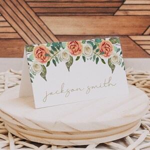 rustic peachy orange and white floral thanksgiving dinner place card template from UnmeasuredEvent on Etsy