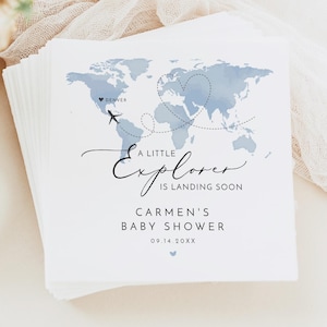 May include: A white ceramic mug with a black handle and the text "But First, Coffee" in a bold, black font. The mug is set against a neutral background, highlighting its simple design.