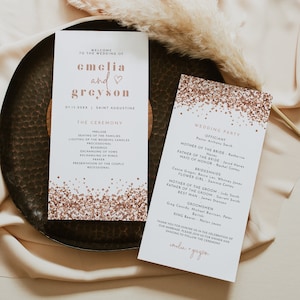 May include: Wedding ceremony program with a rose gold glitter background. The program includes the names of the wedding party and the order of events for the ceremony. The text "cmelia + greyson" is at the bottom of the program.