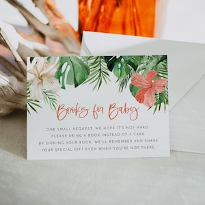 Puede incluir: Una tarjeta blanca con hojas tropicales verdes y flores rosas. El texto en la tarjeta dice "Books for Baby. One small request, we hope it's not hard. Please bring a book instead of a card. By signing your book, we'll remember and share your special gift even when you're not there."