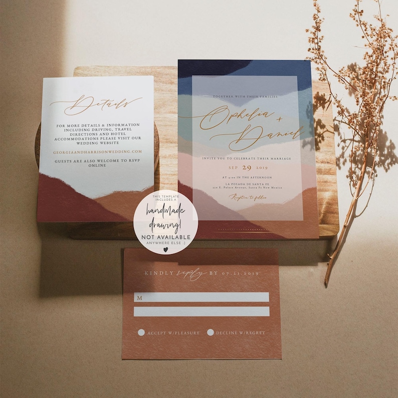 May include: Wedding invitation suite with a modern abstract design. The invitation features a blue, pink, and brown watercolor background with the couple's names in gold script. The RSVP card is a brown rectangle with a white RSVP section and a white circle for accepting or declining the invitation.