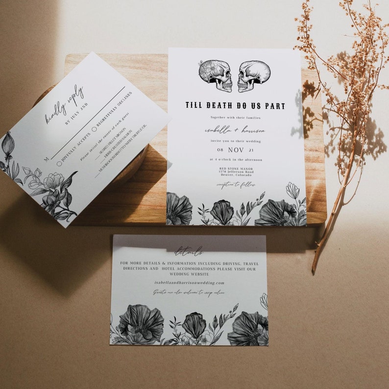 May include: A wedding invitation suite with a black and white floral design. The main invitation features two skulls with the text "Till Death Do Us Part" and the couple's names. The RSVP card has a floral design and the text "Kindly Reply by July 1st". The details card has a floral design and the text "Details" and the couple's wedding website.