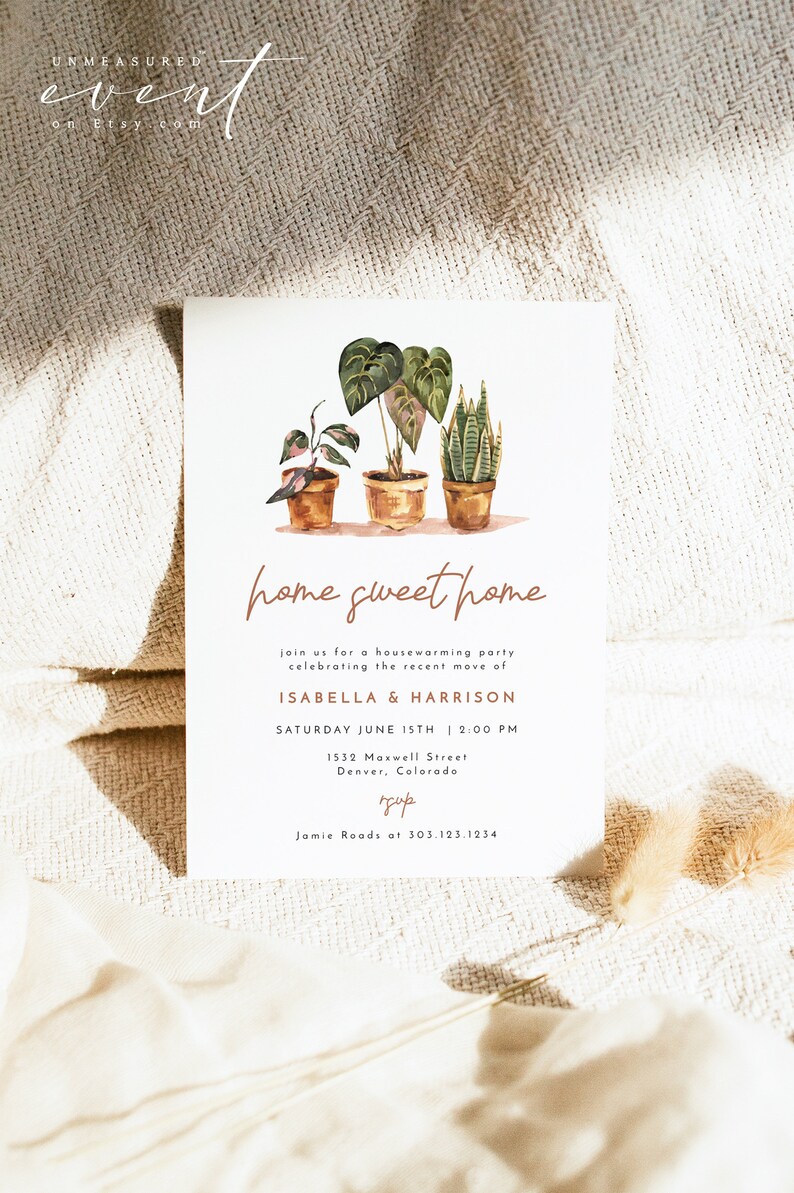 May include: A housewarming party invitation with a watercolor illustration of three potted plants. The invitation reads "home sweet home" and includes the names Isabella & Harrison, the date Saturday June 15th, the time 2:00 PM, the address 1532 Maxwell Street, Denver, Colorado, and the RSVP information Jamie Roads at 303.123.1234.