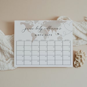 Peut inclure: Un jeu de baby shower imprimable avec un fond de carte du monde. Le jeu demande aux invit&eacute;s de deviner la date de naissance du b&eacute;b&eacute;. Le jeu est intitul&eacute; "Devinez la date de naissance de b&eacute;b&eacute; Robinson".