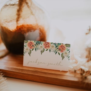 rustic peachy orange and white floral thanksgiving dinner place card template from UnmeasuredEvent on Etsy