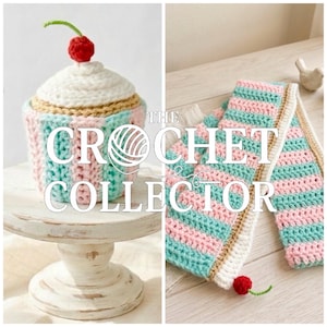 May include: Crocheted cupcake with a cherry on top, displayed on a white pedestal. The cupcake features alternating stripes of pink, teal, and white. A matching crocheted scarf with pink and teal stripes is also shown.