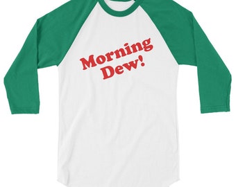 May include: A white and green baseball tee shirt with the text "Morning Dew!" in red.