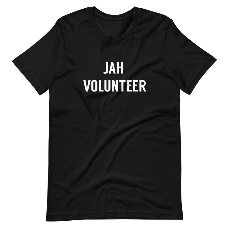 May include: Black t-shirt with white text that reads "JAH VOLUNTEER".