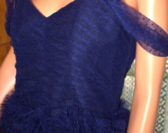 Marchesa Notte blauwe cocktailjurk met ruches en stippen