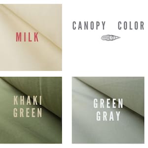 Puede incluir: Cuatro muestras de tela que muestran diferentes colores para un dosel. Los colores son Leche, Verde caqui, Gris verde.