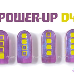 May include: Four purple dice with yellow squares on each side. The dice are labeled "POWER-UP D4".