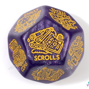 May include: Purple and gold d20 dice with different symbols on each side. The symbols include "Coins", "Scrolls", "Gems", "Magical Items", "Traps", and "Monsters".