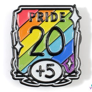May include: A rainbow-colored enamel pin with a black outline. The pin features the word "PRIDE" and the number "20" in a large font. A smaller circle with the number "5" inside is below the number "20".