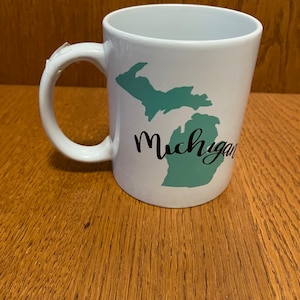 12oz Coffee Mug with the stat of Michigan. This unique mug for a gift.  Dishwasher safe.