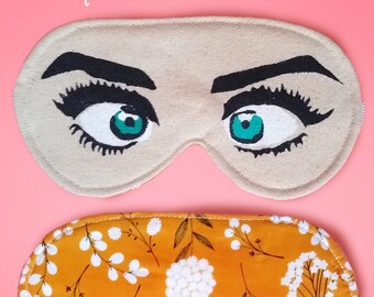 sleep mask with eyes on it