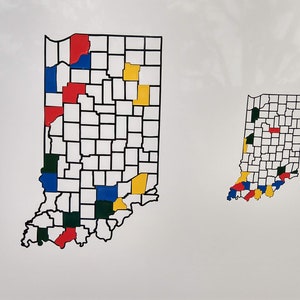 May include: A map of Indiana with different colored squares representing different counties. The map is on a white background.