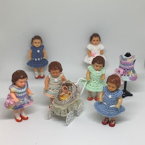 Nice crocheted dresses for Ari doll of 7.5 cm