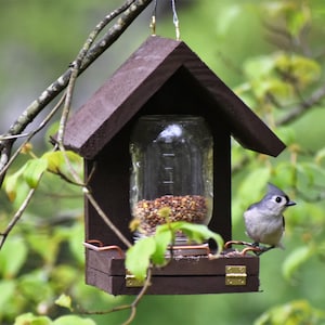 These Bird Feeders work! Easy to Fill, Easy to Clean - Feed the birds with this handcrafted Mason Jar time tested bird feeder!