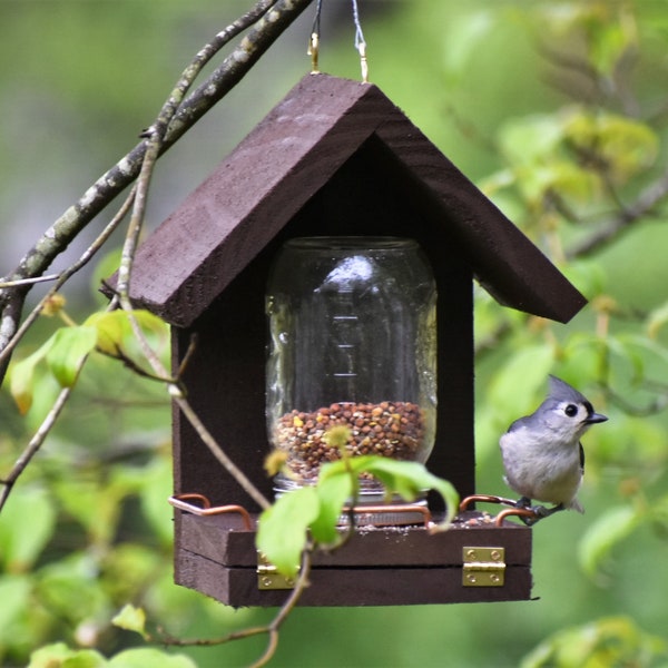 These Bird Feeders work! Easy to Fill, Easy to Clean - Feed the birds with this handcrafted Mason Jar time tested bird feeder!