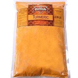 May include: A resealable bag of Delish brand turmeric spice. The bag is filled with bright yellow turmeric powder. The bag is labeled "Turmeric" and "16 oz (454g)".