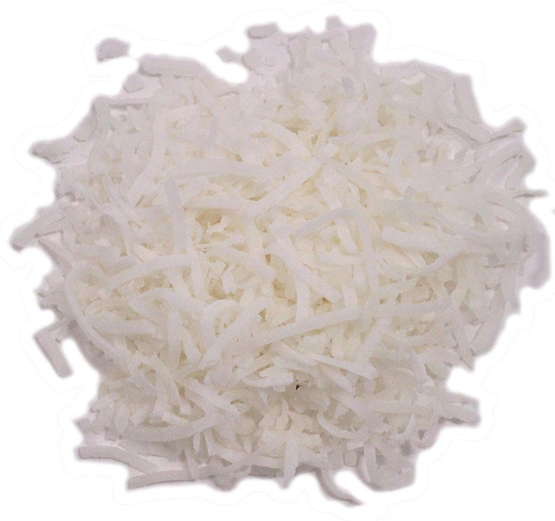 May include: A close-up of a pile of unsweetened shredded coconut. The coconut is white and fluffy, and it is perfect for baking or adding to smoothies.
