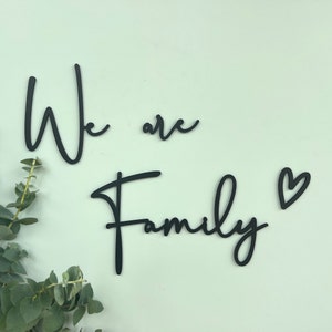 Black wooden lettering We are Family wall decoration to match photo collage image 2