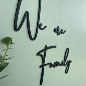 Black wooden lettering We are Family wall decoration to match photo collage image 3