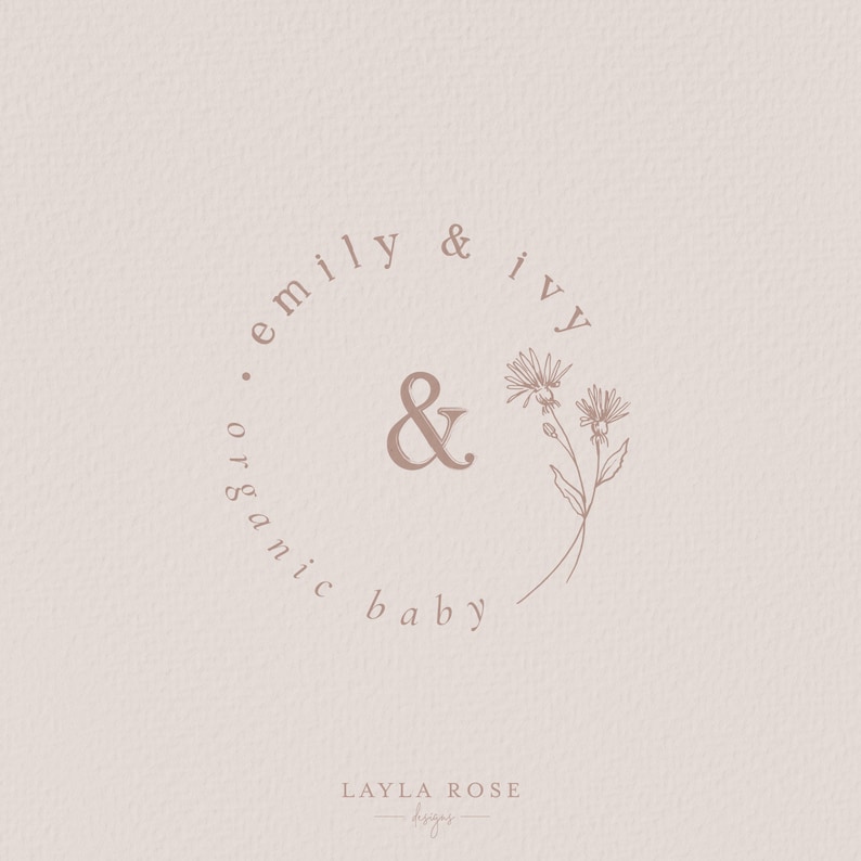 May include: A logo design for a company called "emily & ivy organic baby" with a stylized ampersand and floral illustration. The text "LAYLA ROSE designs" is also included.