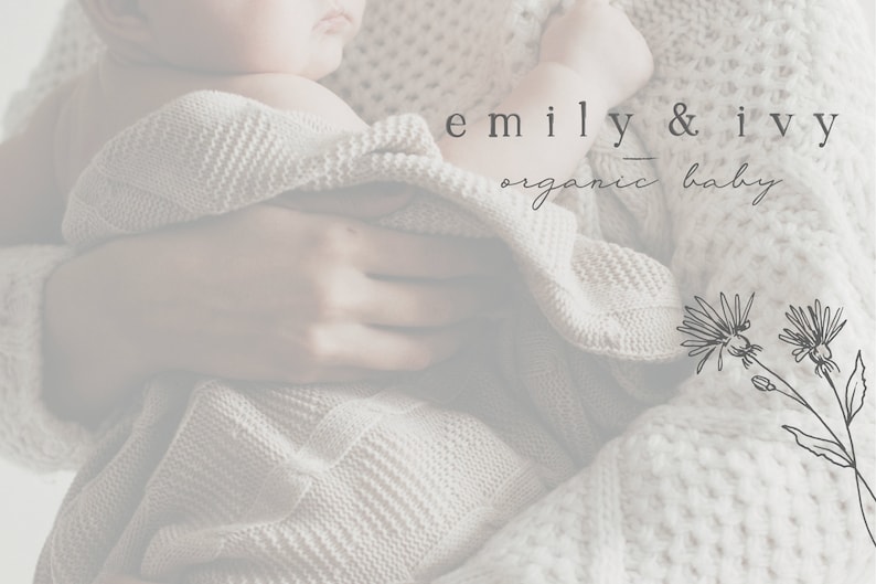 May include: A close-up of a person holding a baby wrapped in a white knitted blanket. The text "emily & ivy organic baby" is visible in the image.