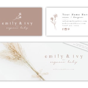 May include: A business card with a light brown background and white text. The text reads "emily & ivy organic baby" and includes a floral illustration. The card also includes contact information for the business, including a website address, email address, and phone number.