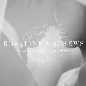 May include: Black and white photo of a couple kissing with a floral design and the text "Rosaline Mathews Wedding Photography" superimposed over the image.