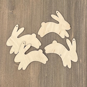 Coniglietti saltanti figure in legno, giocattolo spaziale per bambini da appendere, coniglietti tagliati al laser, decorazione per feste a forma di coniglietto, forma in legno non colorata per lavoretti a punti