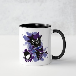 May include: White ceramic mug with a black rim and handle. The mug features a watercolor-style design of three purple and black ghost Pokemon, Gengar, Haunter, and Gastly.