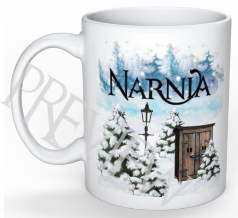 May include: White ceramic mug with a winter scene featuring a snowy landscape, trees, a lamppost, and a small wooden building. The text "Narnia" is printed in black on the mug.