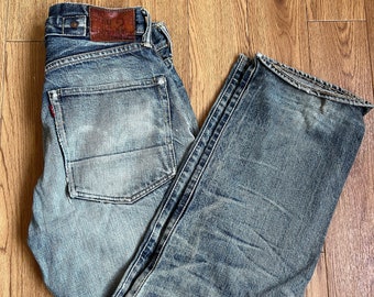 Vintage Evisu Jeans: Made in Japan Distressed Indigo Denim (30x35)