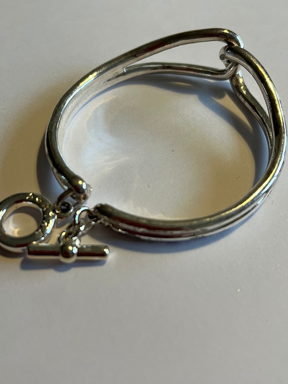 Agatha Paris Vintage bracelet silver Colour Entwined bangle costume jewellery French Jewellery designer AGATHA Paris
